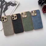 Variety of Electroplated Frame lambskin phone shell phone case in Grey, Blue, Black, and Green Colors with Gold Camera Lens on White Table